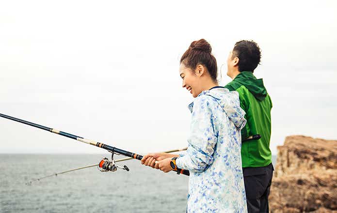 フィッシング　釣りを楽しむ男女　カップル