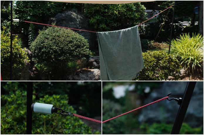 ポールにハンギングロープをセットしている