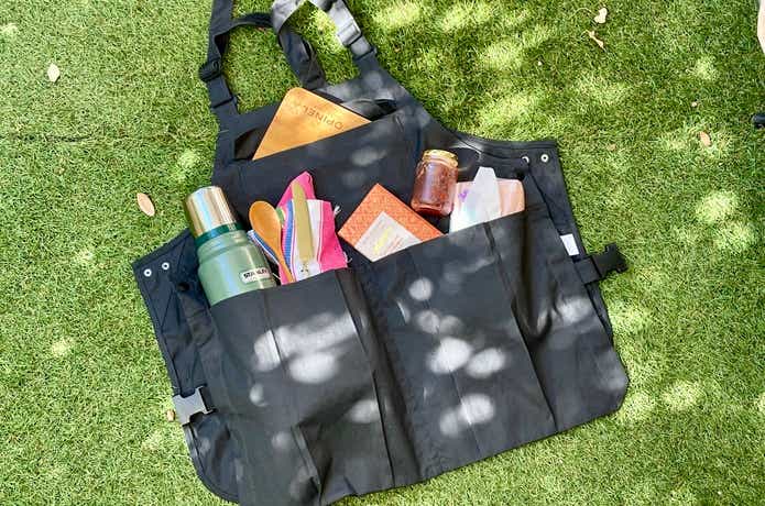 無印良品アウトドアエプロンにべランピングアイテムを収納